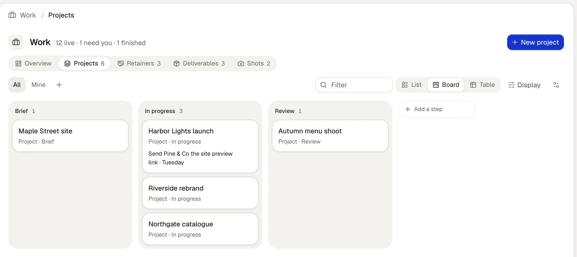 Work, on the Projects tab as a board: the views All and Mine with +, then Filter, List, Board and Table, and Display; the steps Brief, In progress and Review, with a card for each project and what's next on Harbor Lights launch, and Add a step after the last one